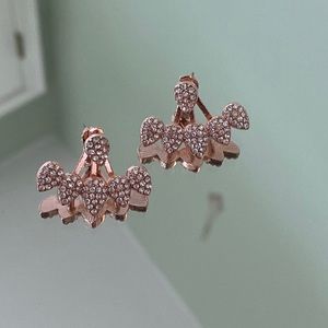rose gold leaf earrings with a leaf cuff jacket